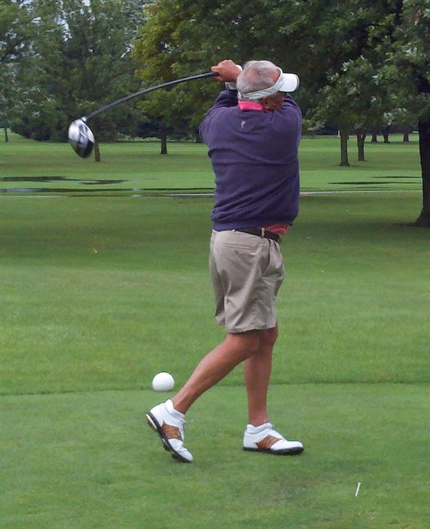 Past Champion Richard Stevens finishes nicely on one of his tee shots during the senior tournament.&nbsp; (Below Left)&nbsp; Fred Hubert opens up the tournament with a nice tee shot on the opening hole.